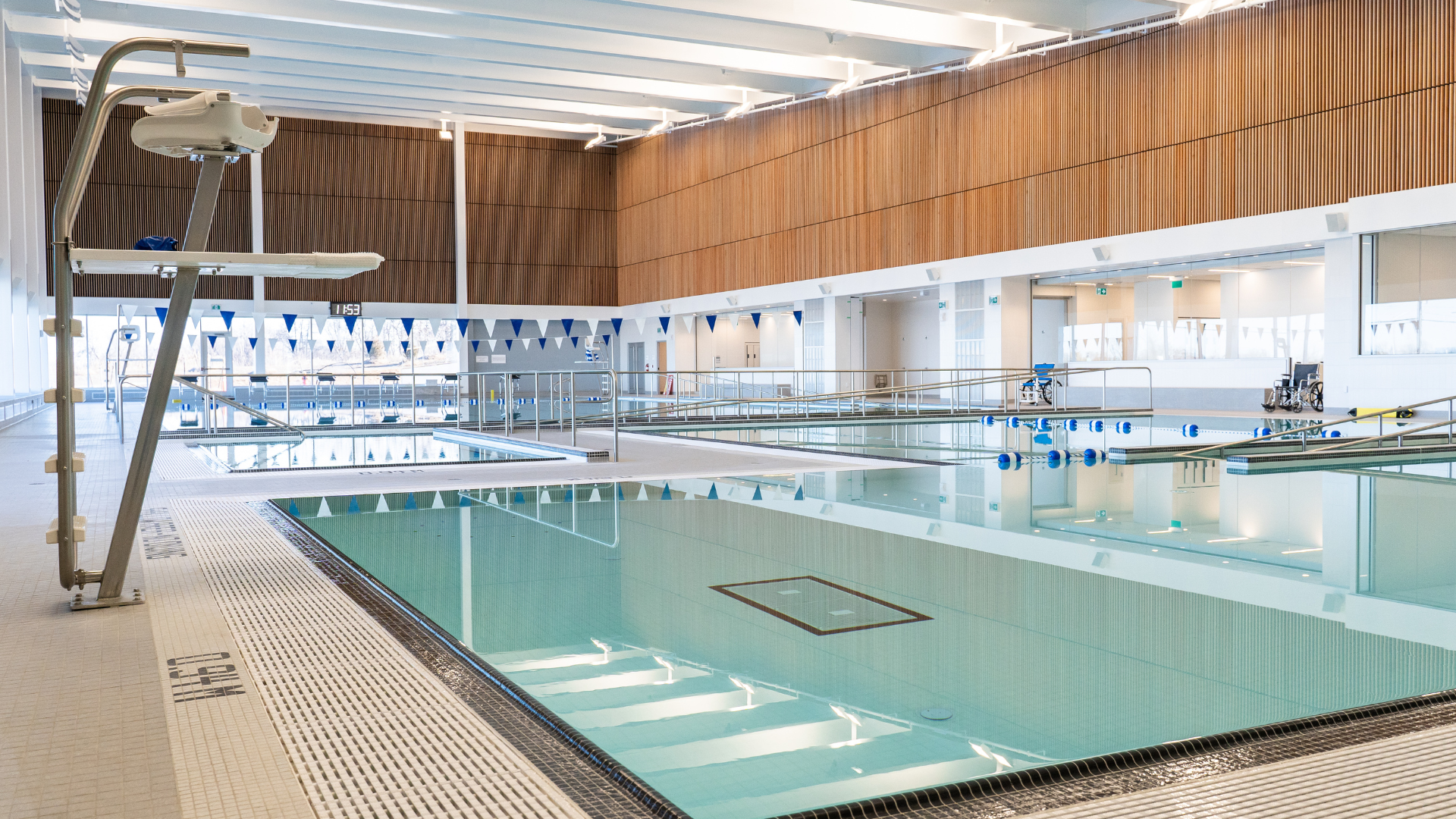 Empty public pool with lifeguard station