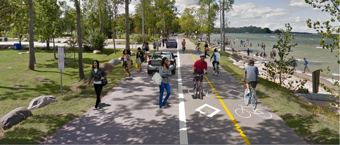 Rendering of a one way street and a multi-use pathway