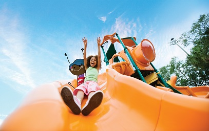Girl on orange slide Girl on orange slide