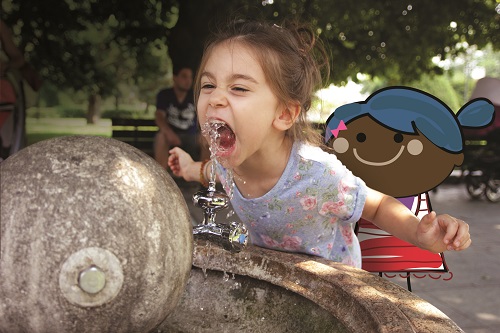 Girl drinking water from fountain Girl drinking water from foutain