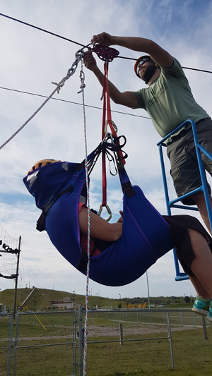 Reverse Zipline Girl in reverse zipline
