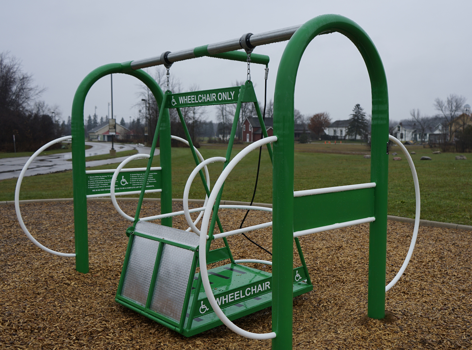 Wheelchair accessible swing in a playground