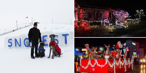 Man and two dogs in front of snow hill, house lit up with Christmas lights, parade float with Santa Claus