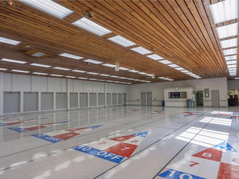 Hall space with markings for shuffleboard on the floor