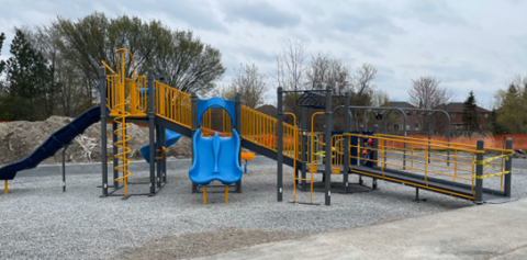 empty playground with slides and a ramp up