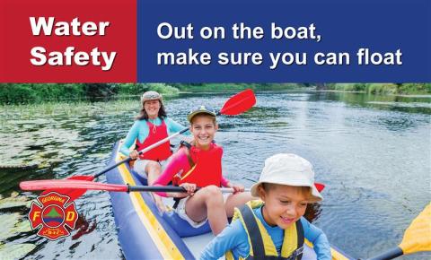 Mother and two children in a canoe wearing lifejackets with the text Water Safety Out on the boat, make sure you can float