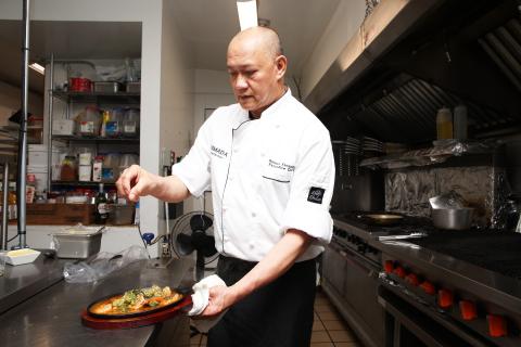 Chef at the Ramada in Jackson's Point, Georgina Chef making food in Georgina restaurant