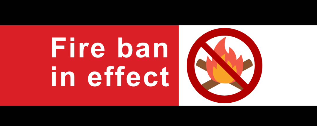 graphic image of a fire with a line through it and the words, fire ban in effect