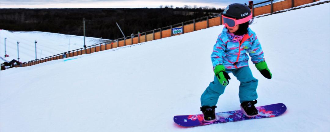 kid snowboarding