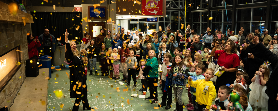 children celebrating new years with confetti