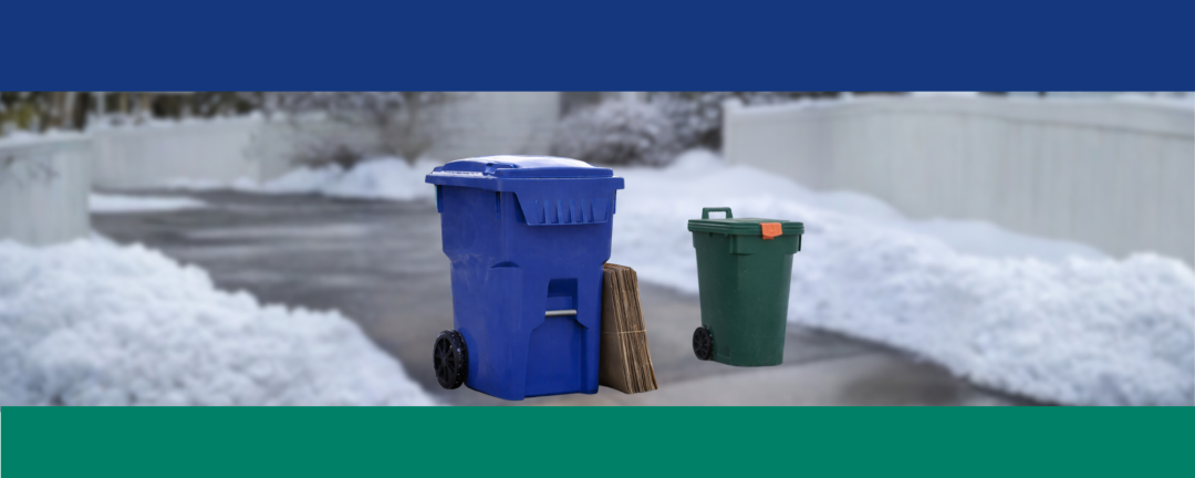 blue recycling cart with bundled cardboard beside it and a green bin