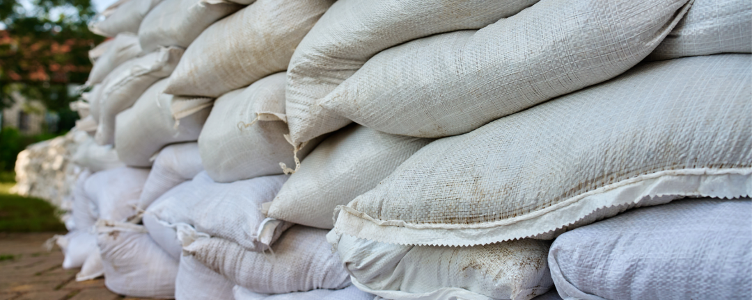 White sandbags piled up